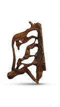 Abstract carved wooden art piece: