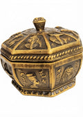 Gold-tone antique hexagonal storage box or trinket jar adorned with pharaonic reliefs and hieroglyphs