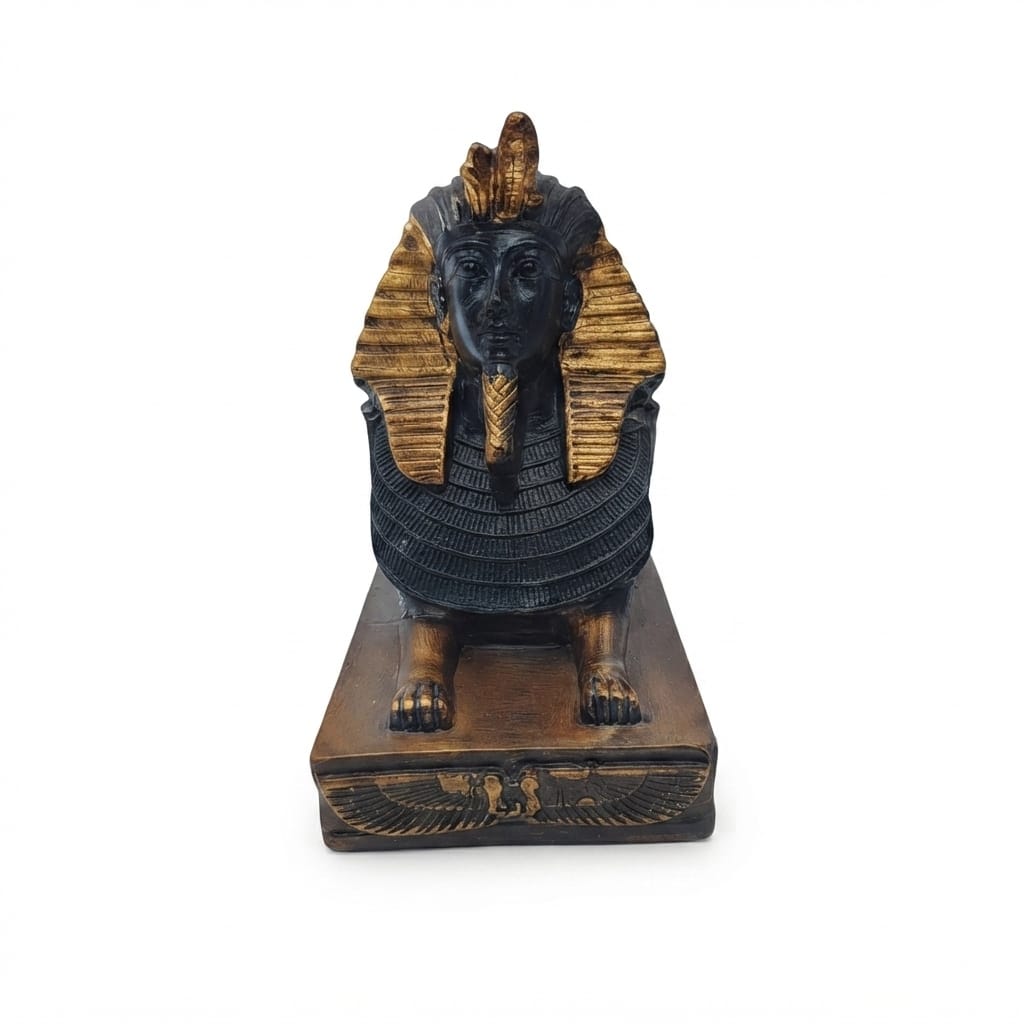 Black and gold Pharaonic sphinx figurine on an inscribed base