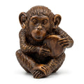Detailed Wooden Finish Monkey Figurine Holding a Disc