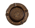 Bronze-tone round ashtray featuring a pharaonic profile in the center and hieroglyphic borders