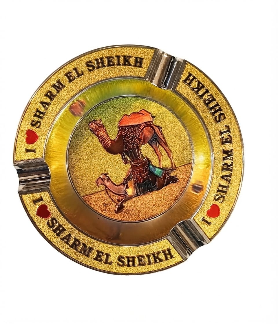 Round souvenir ashtray inscribed with "I LOVE SHARM EL SHEIKH" and a desert camel graphic
