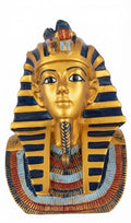 Gold bust of King Tutankhamun wearing the traditional blue-striped pharaonic nemes headdress