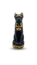 Small black and gold Bastet cat goddess figurine with a colorful collar and an "EGYPT" inscribed base